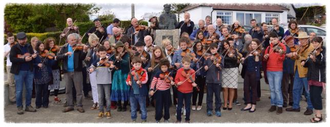 Fiddlers at the popular World Fiddle Day celebration